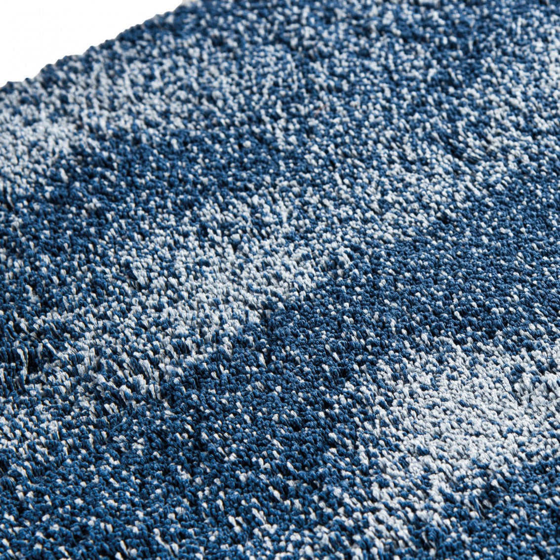 Arctic area rug made from 100% Tencel fibers, ultra soft with high-definition design and anti-slip backing layer