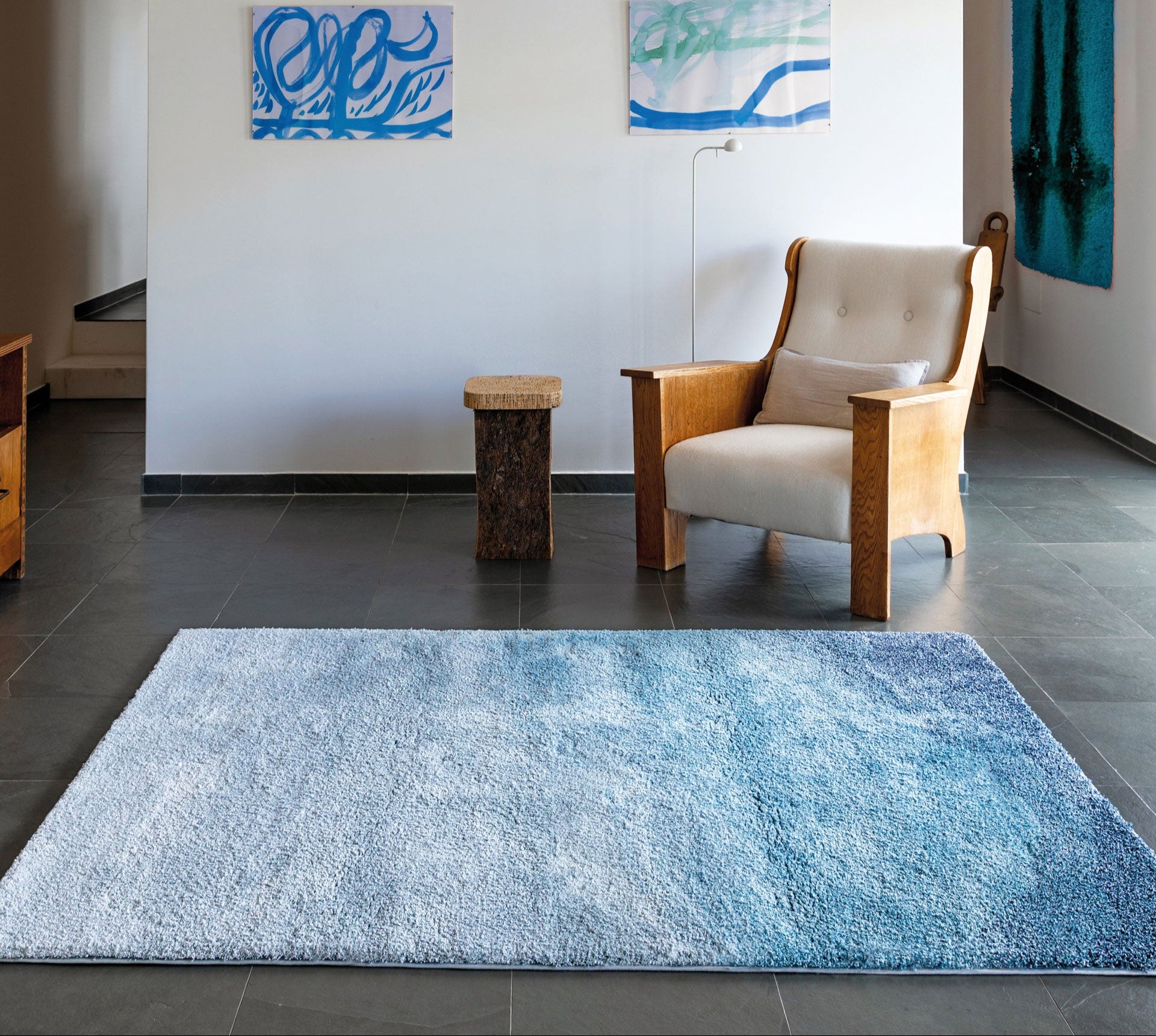 Horizon area rug in blue Tencel with soft gradient design, high-definition texture, and anti-slip backing for a serene, modern interior