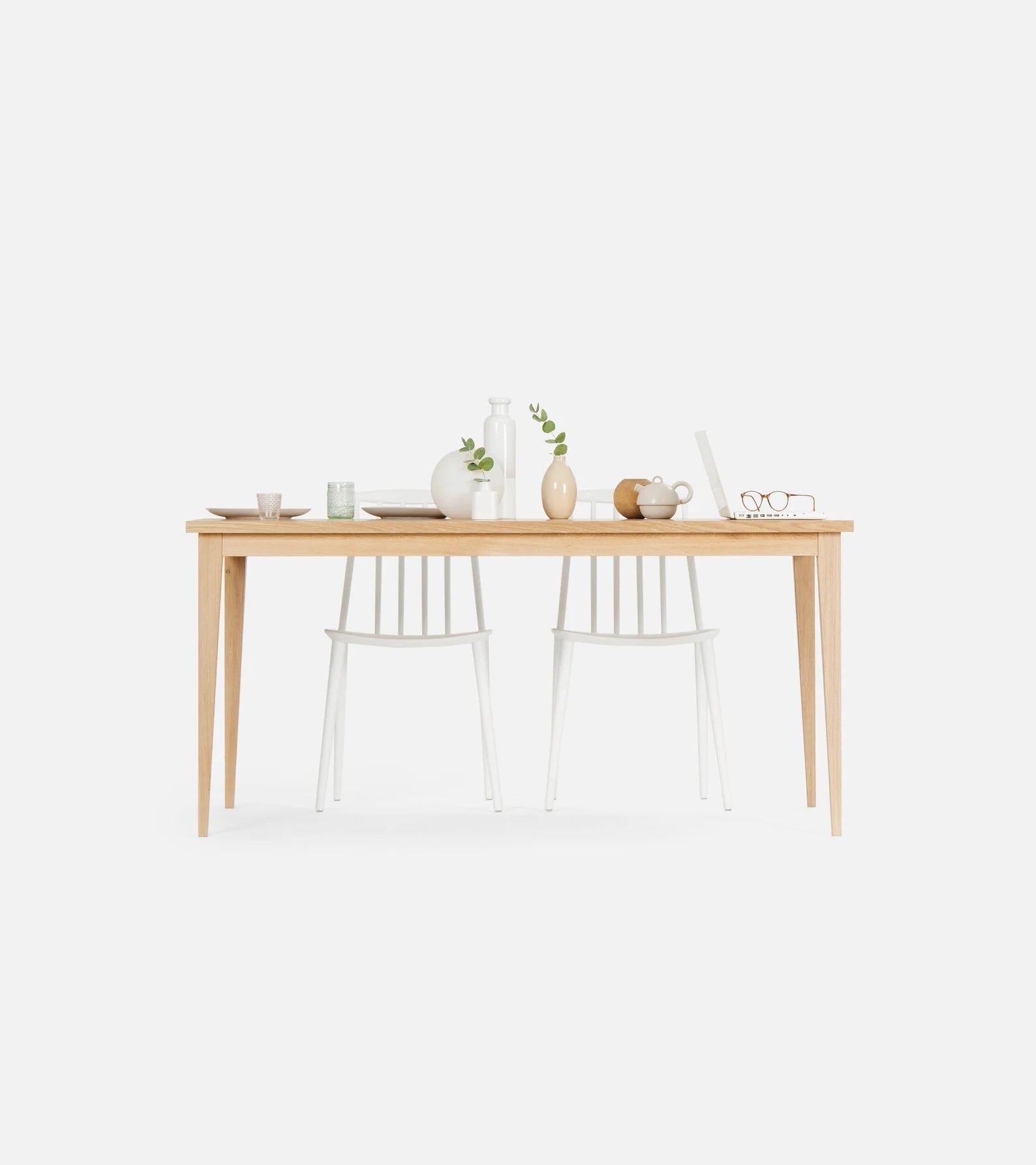 Minimalist solid oak dining table with white-wax finish and natural texture