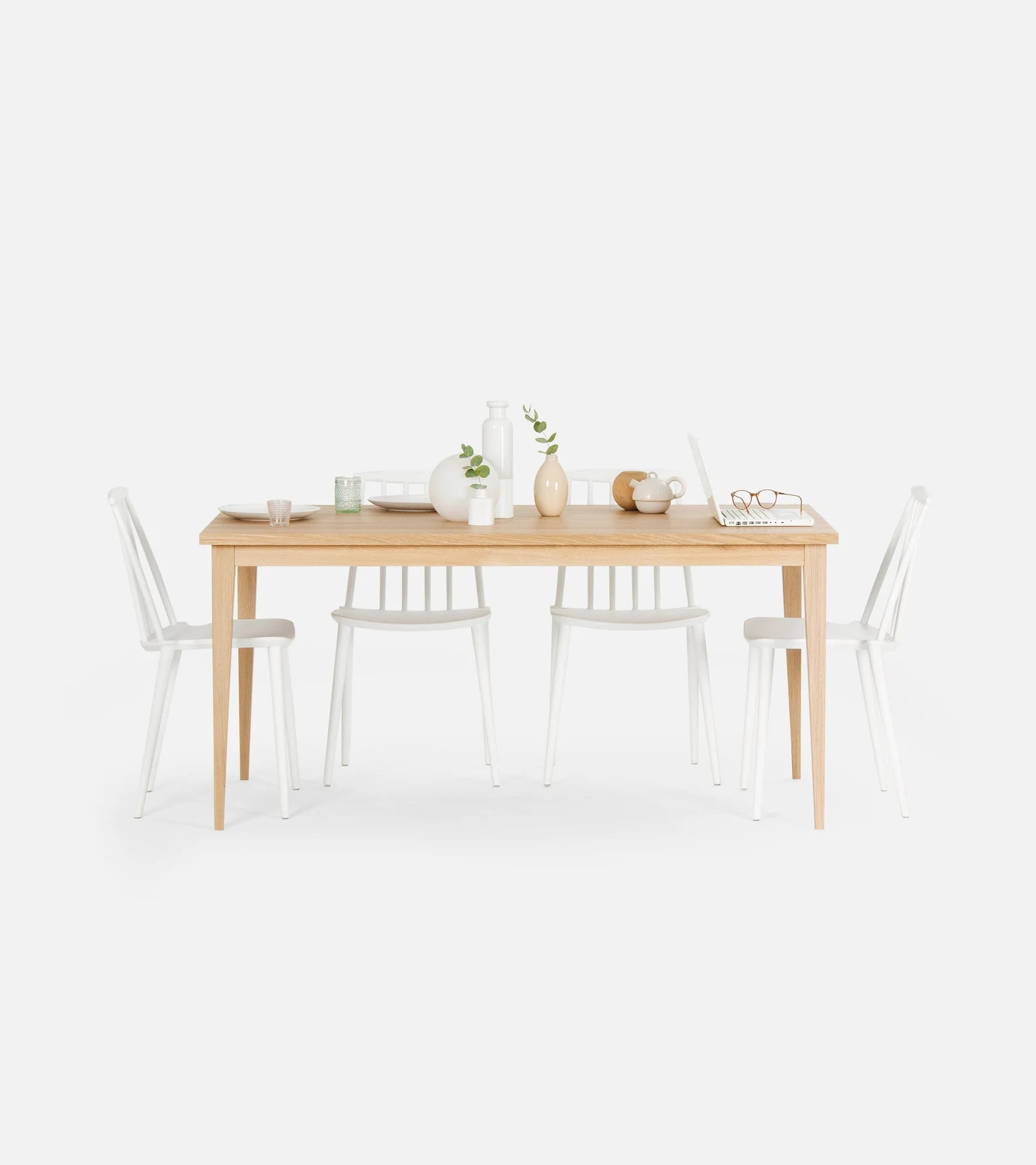 Minimalist solid oak dining table with white-wax finish and natural texture