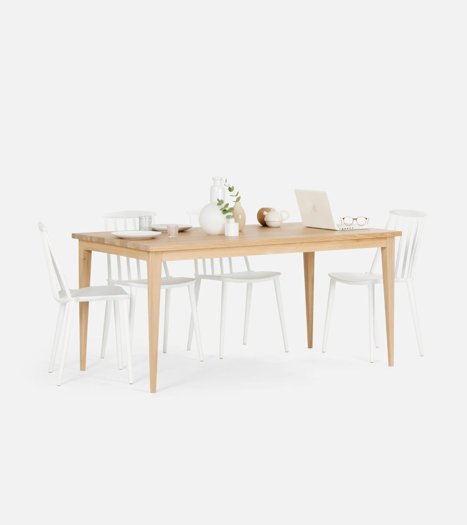 Minimalist solid oak dining table with white-wax finish and natural texture