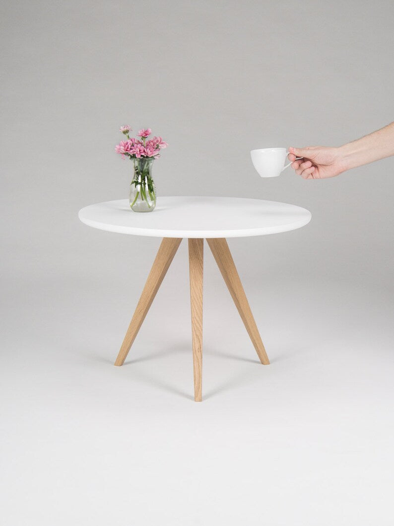 Round coffee table with 3-leg solid oak wood base and matte white scratch-resistant top