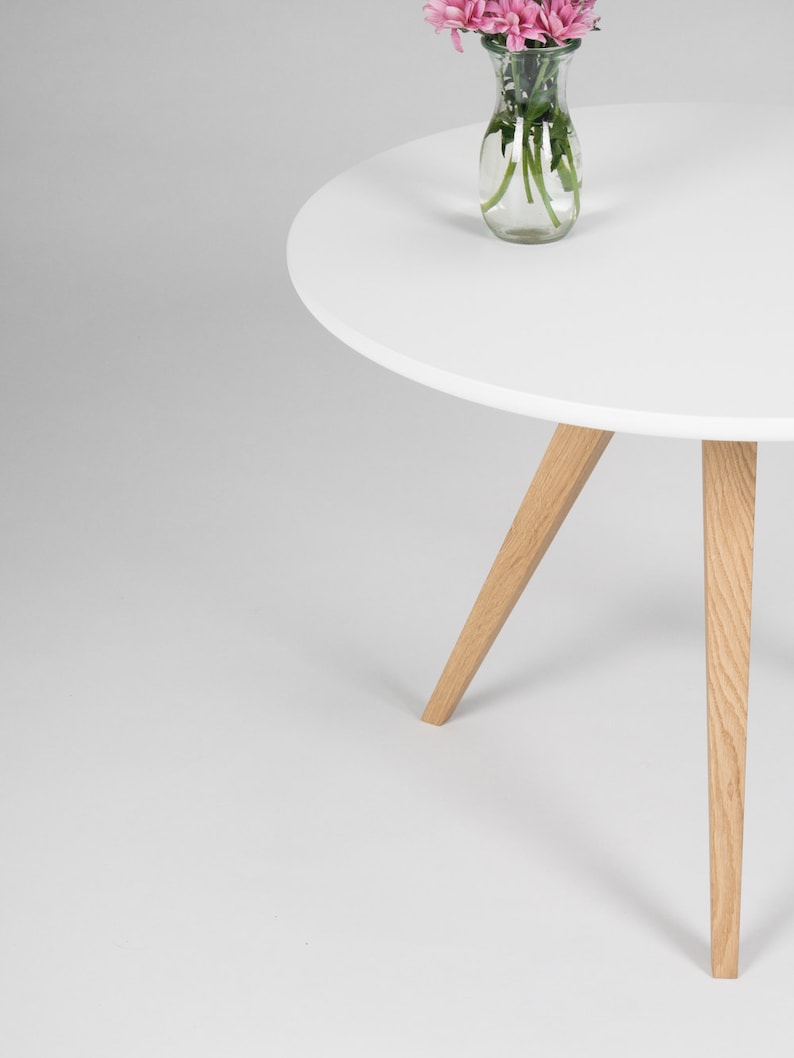 Round coffee table with 3-leg solid oak wood base and matte white scratch-resistant top