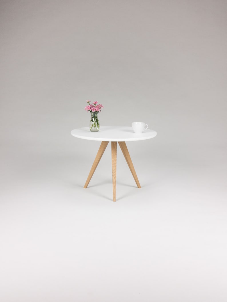 Round coffee table with 3-leg solid oak wood base and matte white scratch-resistant top
