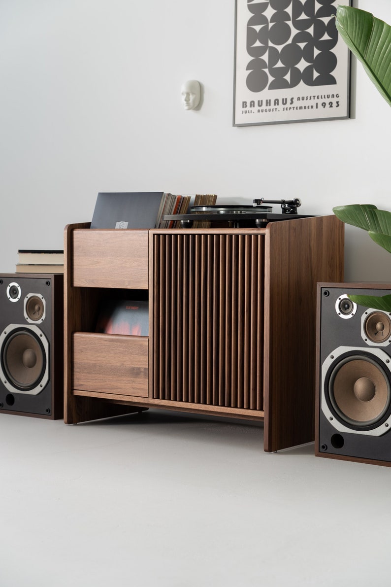 Modern walnut media console with flip-box and lattice doors