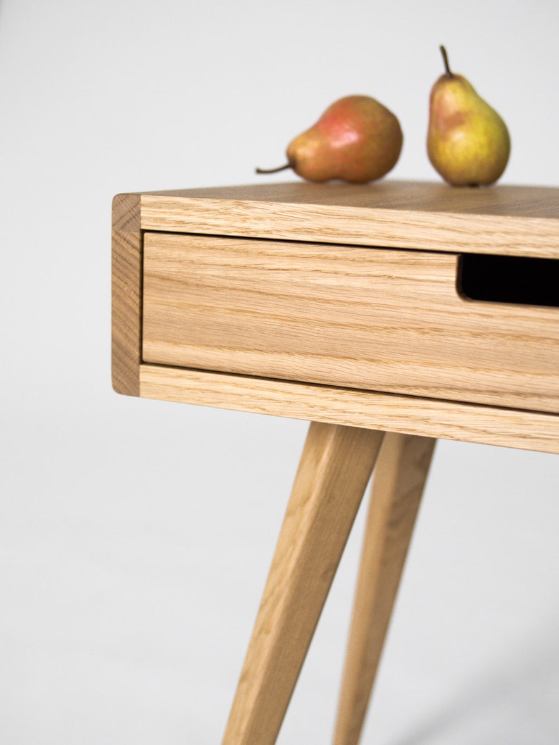 HEIM 1 nightstand in oak with wide drawer, customizable front, and hardwax oil finish