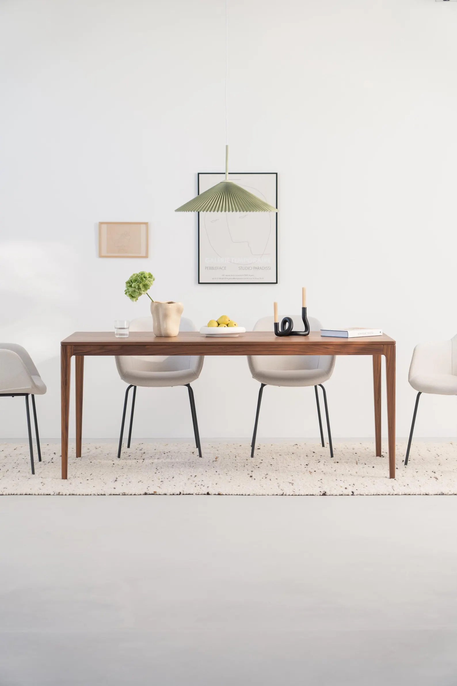 Solid walnut dining table with natural finish and minimalist lines, ideal for gatherings, seats 6 to 8 people