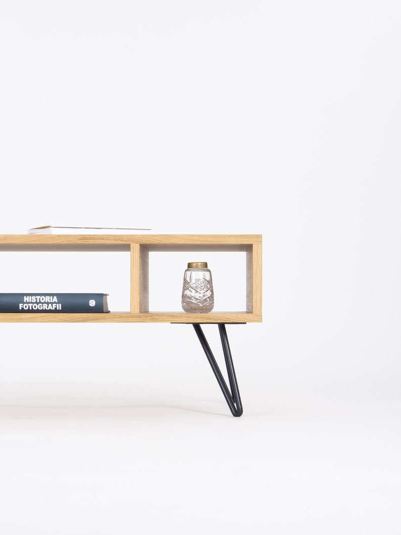 KUUB 3/4+ coffee table with 3/4 and 1/4 open compartments, solid wood top and black steel hairpin legs, finished with hardwax oil