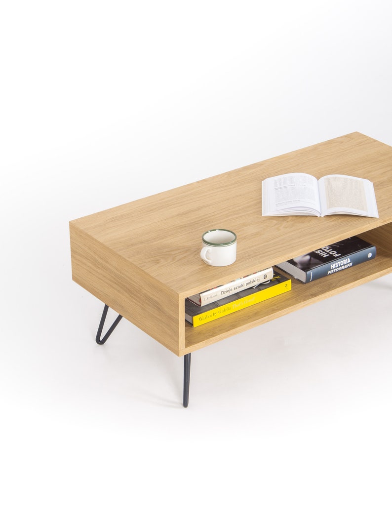KUUB 3/4+ coffee table with 3/4 and 1/4 open compartments, solid wood top and black steel hairpin legs, finished with hardwax oil