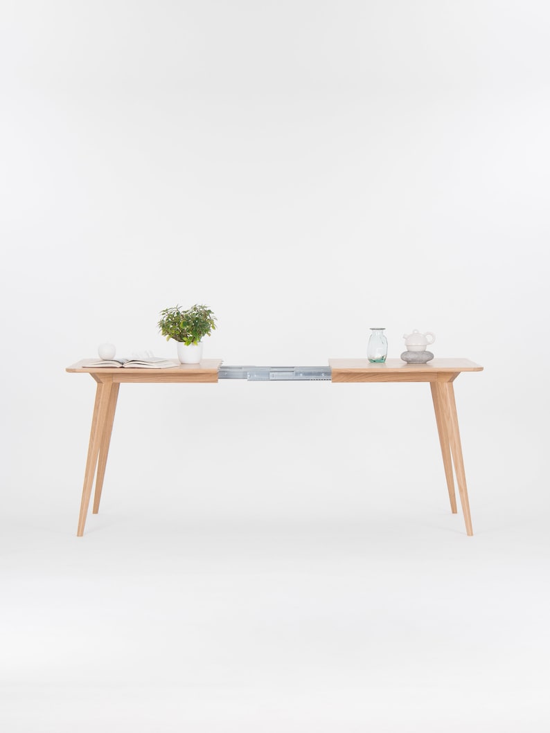 Extendable solid oak dining table with hard oil wax finish, 135 to 185 cm, seats 6 to 8 people