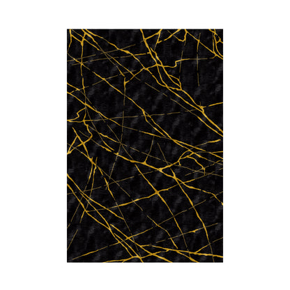 Marble Gold area rug in Tencel with black marble pattern and golden accents, high-definition design, soft texture, and anti-slip backing
