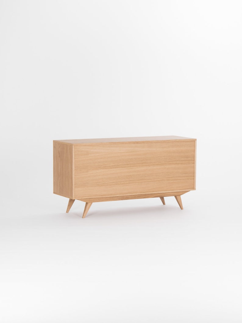 KUUB 6 sideboard featuring four drawers, two open compartments, customizable fronts, crafted in solid oak, finished with hardwax oil