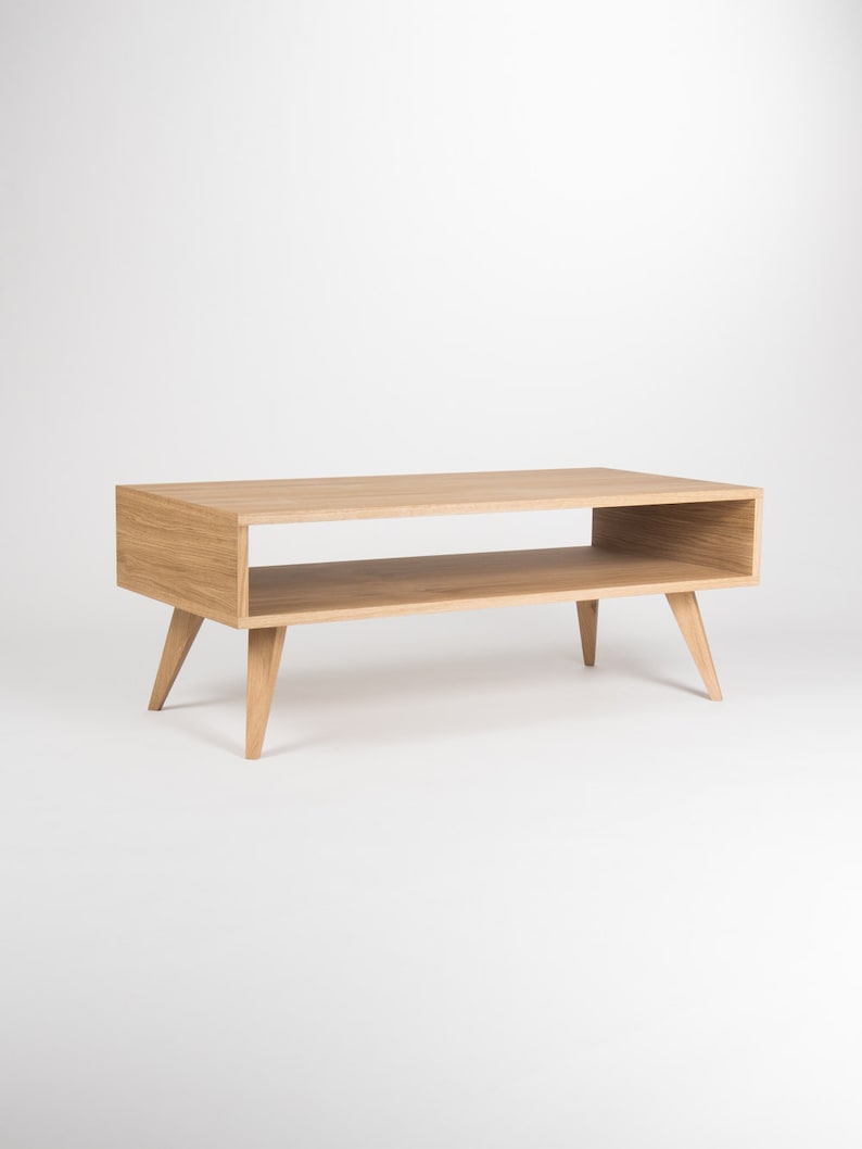KUUB 0 coffee table with one undivided open storage space in solid oak, finished with hardwax oil