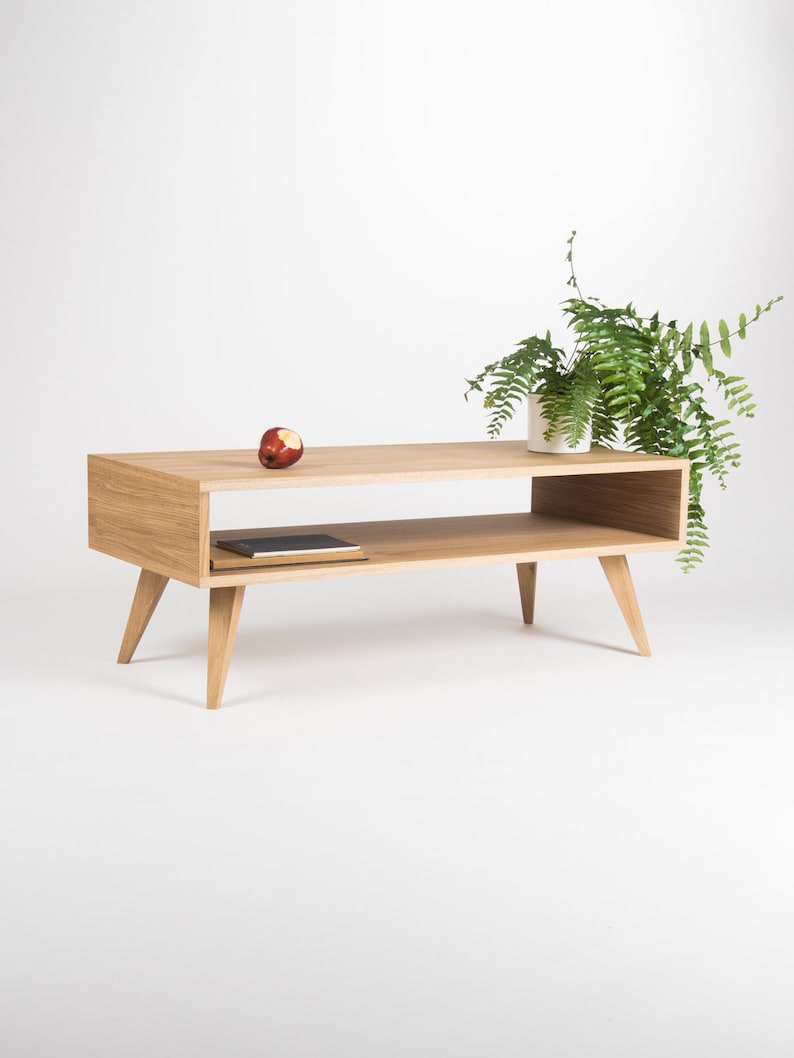 KUUB 0 coffee table with one undivided open storage space in solid oak, finished with hardwax oil