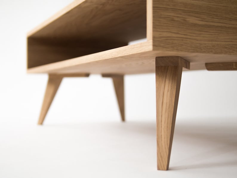 KUUB 0 coffee table with one undivided open storage space in solid oak, finished with hardwax oil