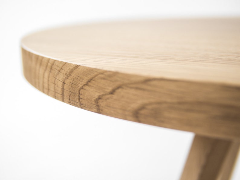 OKKO 60 compact round coffee table in solid oak with hardwax oil finish and natural wood grain