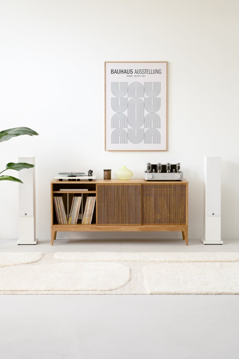 Wide oak media console with openwork front and customizable compartments 