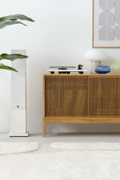 Wide oak media console with openwork front and customizable compartments 