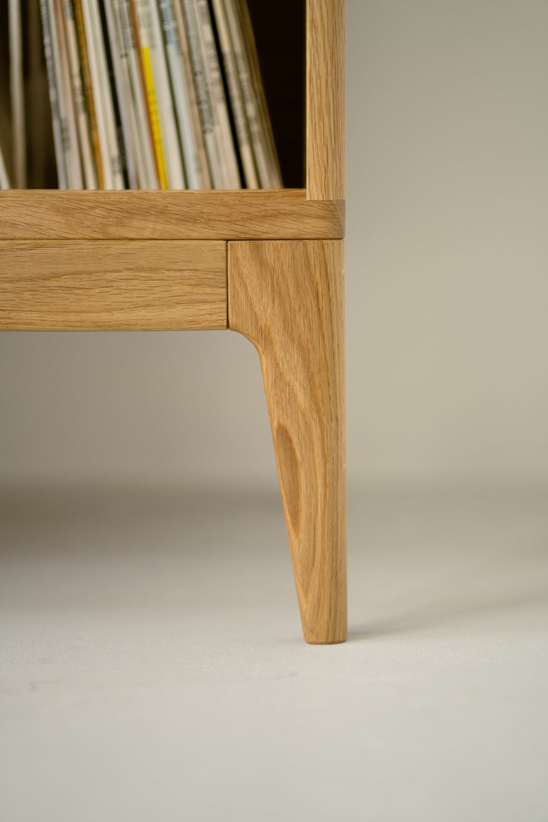 Wide oak media console with openwork front and customizable compartments 