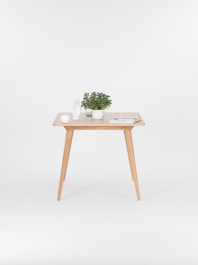Extendable solid oak dining table with hard oil wax finish, 135 to 185 cm, seats 6 to 8 people 