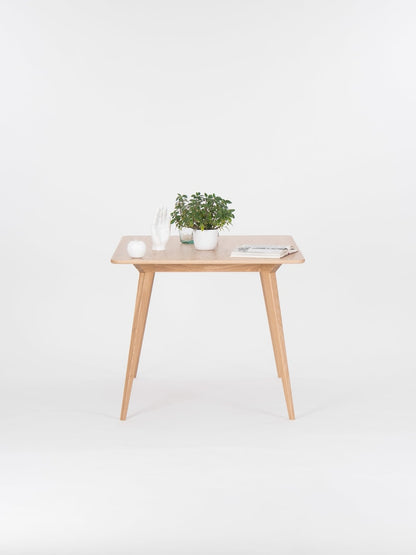 Extendable solid oak dining table with hard oil wax finish, 135 to 185 cm, seats 6 to 8 people 