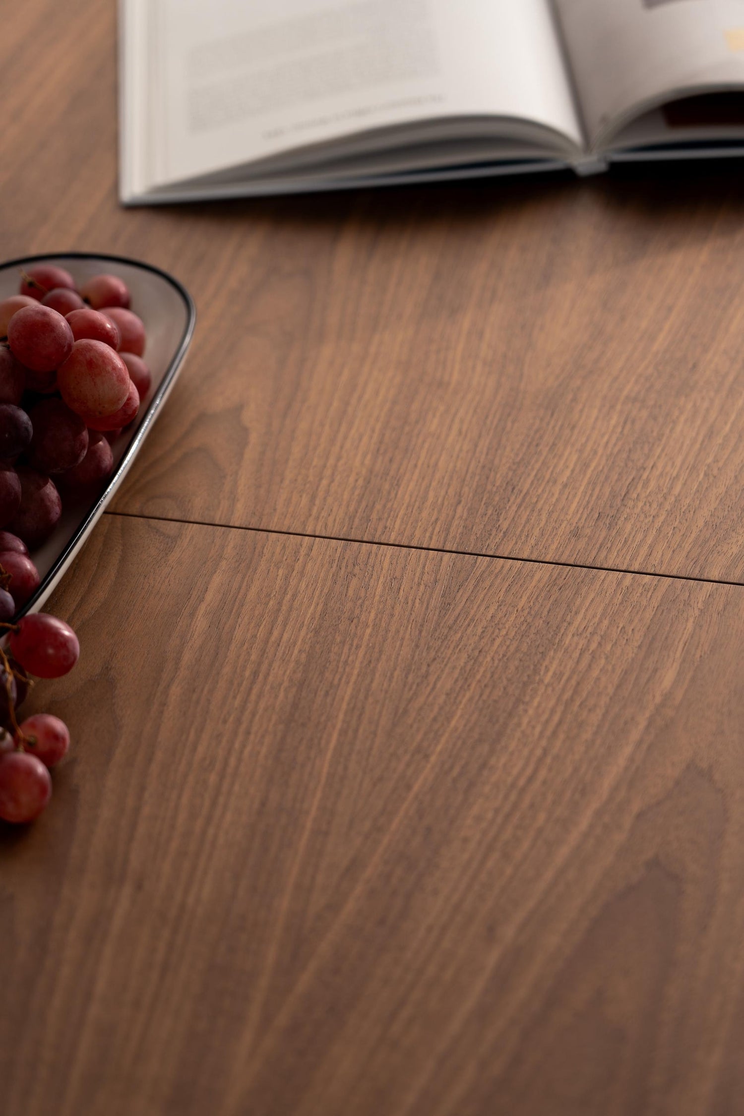 Extendable solid walnut dining table with hard oil wax finish, 135 to 185 cm, seats 6 to 8 people 